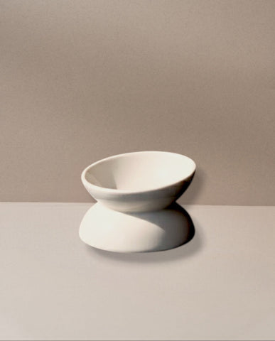 White ceramic bowl on a neutral background