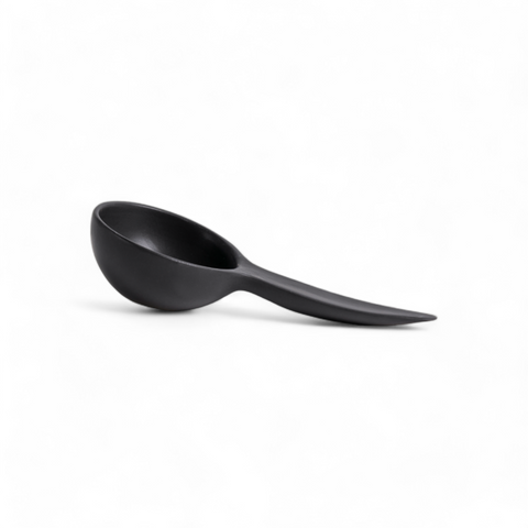 Single stoneware bowl with a spoon shape, displayed against a white background.