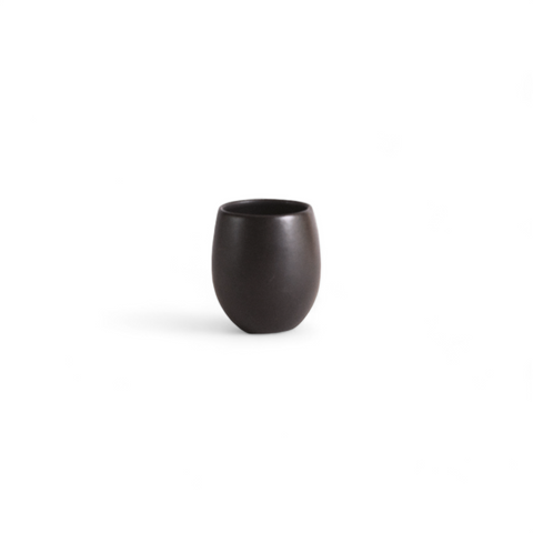 Single stoneware espresso tumbler in a matte black color displayed against a white background