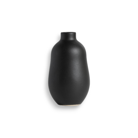 Matte black handmade enameled stoneware vase with a minimalistic and ethno-contemporary design, displayed on a white background